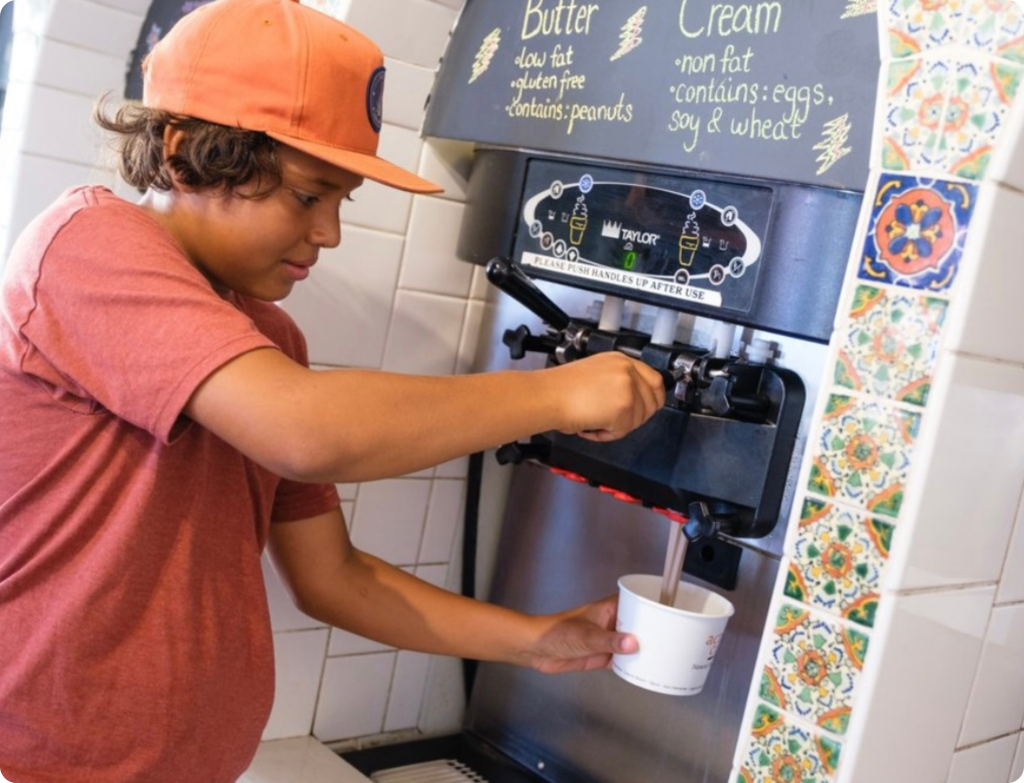 Kid serving froyo